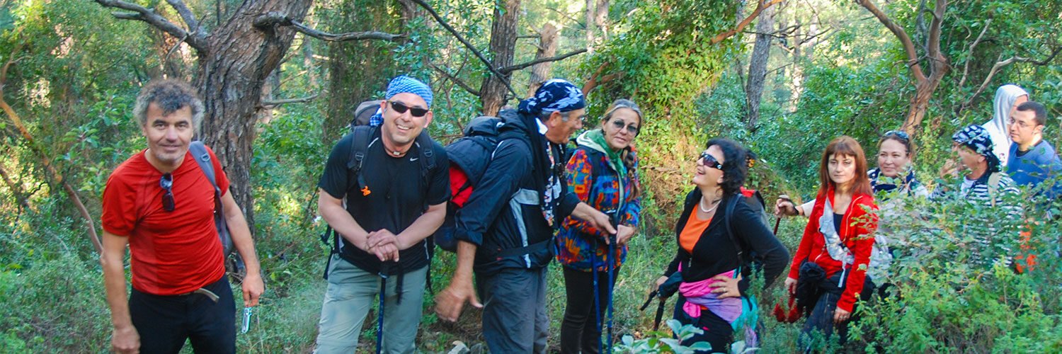 A group of people, including me, are hiking in the nature.