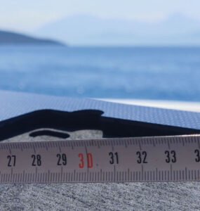 Measuring tape with the Aegean Sea at the background.