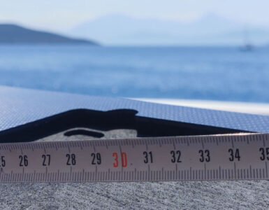 Measuring tape with the Aegean Sea at the background.