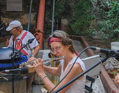 Three musicians playing their instruments at an event in Bodrum Castle.