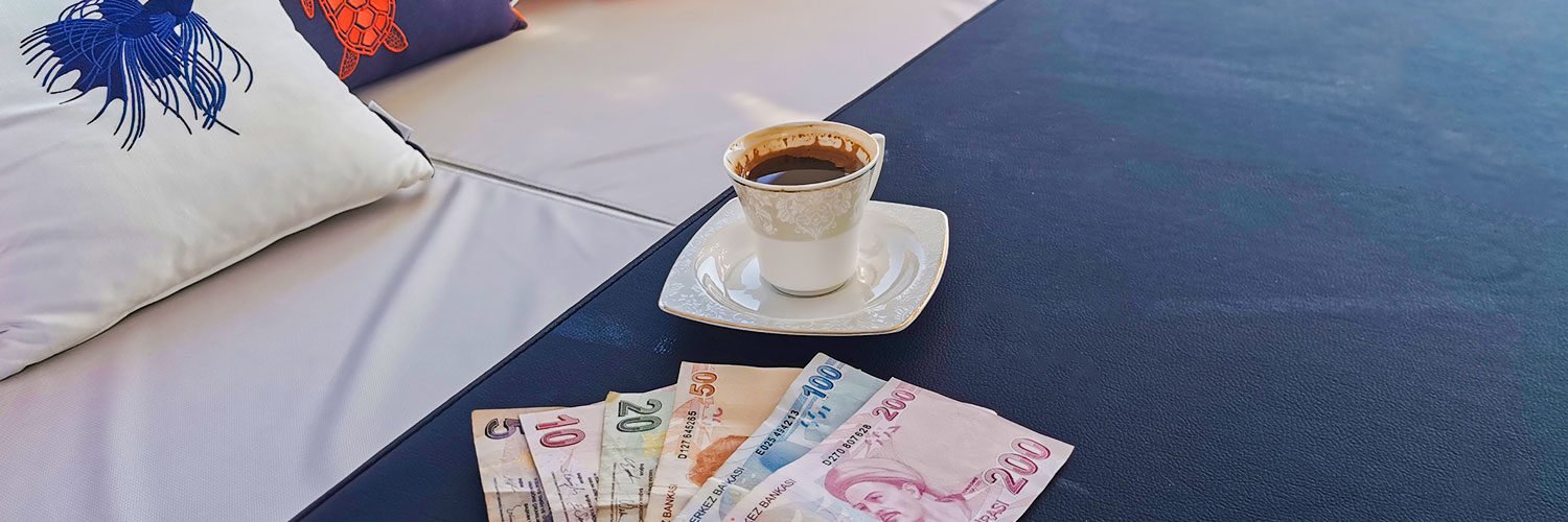 6 different banknotes of Turkish Lira and a Turkish café.