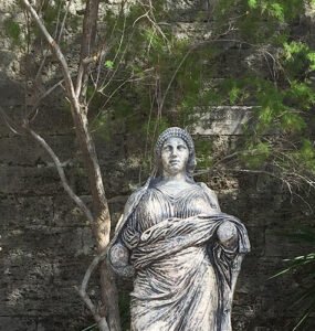 Three historical figures from ancient times: Herodotus, Mausolus and his wife Artemisia II