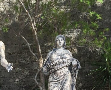 Three historical figures from ancient times: Herodotus, Mausolus and his wife Artemisia II