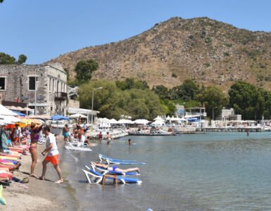 Visitors enjoying the summer weather in Bodrum at Akyarlar beach