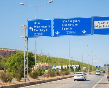 An expressway with traffic signs pointing Bodrum.
