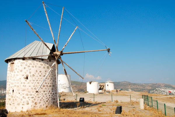 Historic stone windmills on a hilltop in Bodrum.