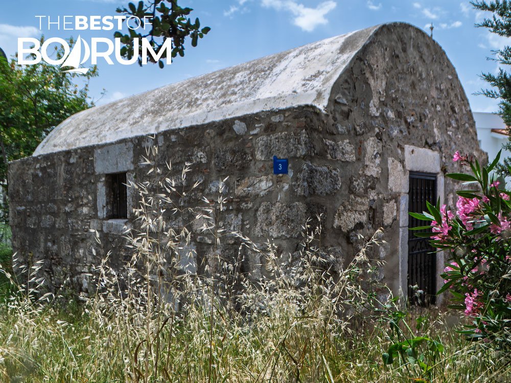 An old stone building found while walking through a narrow alley in Bodrum, showing how exploration leads to unexpected discoveries among the many things to do in Bodrum.