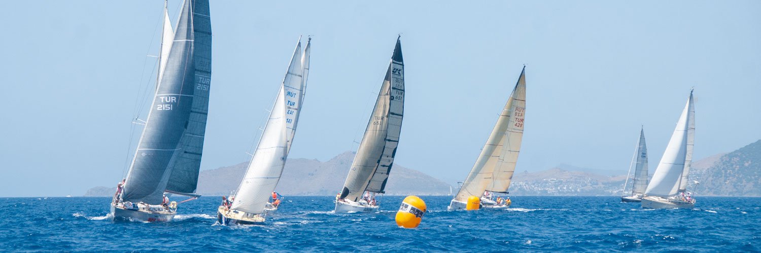Sailing races on the Aegean Sea during a sunny day, one of the popular Bodrum attractions.