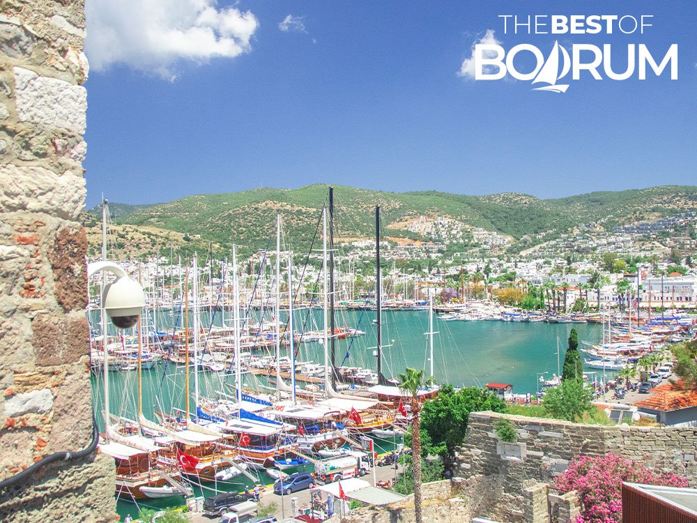 View of Bodrum Turkey from the castle walls, showing the old harbour, boats, and the town centre.