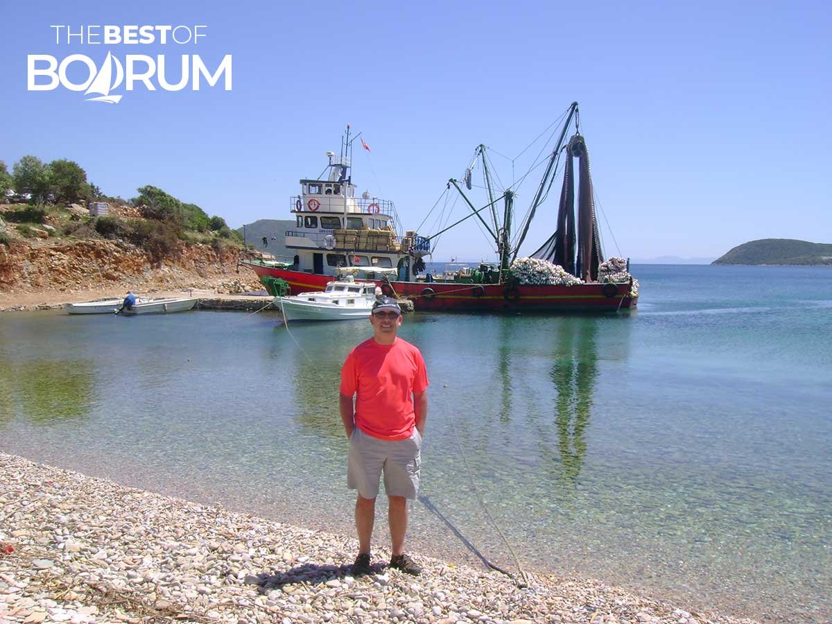 Man standing by the sea at Fishermen Cove in Bodrum in 2008